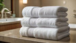 A stack of white terry towels close-up.