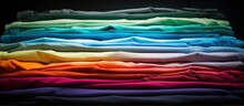 Stack Of Colorful Spectrum T-shirts.