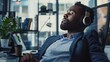business, technology and people concept - happy african american businessman with headphones and computer listening to music at office