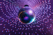 © Anton Pentegov - disco ball with mirror surface and bright rays, hanging on ceiling, night party background