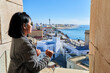 Woman looking towards the city of Cadiz