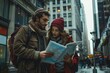 © Vitalii Shkurko - a young couple, a man and woman looking for direction in the city, they are holding a map.