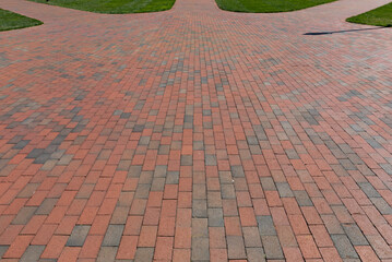 Large brick pathway splitting off into 3 different paths, choices of path to take, creative copy space, horizontal aspect