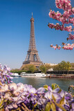 Fototapeta Paryż - Eiffel Tower with boat during spring time in Paris, France