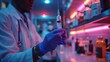 Scientist Holding Syringe in Lab Coat