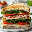 Delicious layered turkey sandwich with crisp lettuce and ripe tomato.