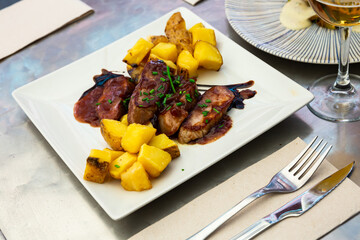 Sticker - Close up of delicious baked pork with potatoes, served on plate