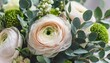 delicate wedding bouquet of ranunculus flower freesia and eucalyptus leaves close up floral background