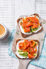Wall Mural - Two open sandwich, toast with salmon, cream cheese, avocado