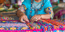 A Woman Is Making Bracelets With Colorful Beads