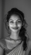 © sravanthi - Monochromatic Portrait of a happy and beautiful Indian woman