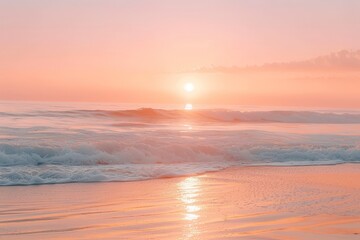 Wall Mural - The golden sun sinks below the horizon, casting a warm glow over the ocean waves as they roll gently towards the shore