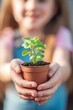© lanych - Kid hands holding a plant. Generative AI