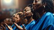 A group of women in electric blue robes are joyfully singing in a church. Their harmonious gestures and shared passion for music make it a fun and entertaining event for all the fans attending