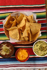 Wall Mural - mexican food tacos guacamole jalapeno pepper quesadillas nacho tortilla tex-mex cuisine healthy food spiced tomato and onion