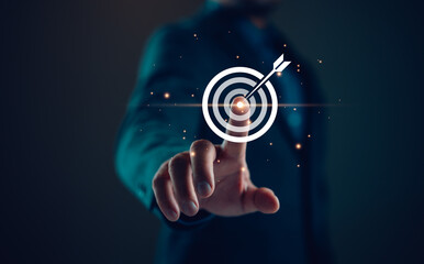 Poster - businessman holding target icon Business Growth and Vision, target Plans and Business Strategies and Competitive Advantage, Banking and Finance, Goal Achievement The path to success.