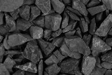 Fototapeta Desenie - Coal. black crushed stone background texture close-up. rubble in a heap.