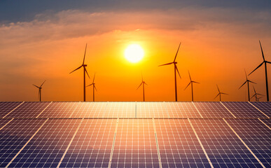 Wall Mural - solar panels with wind turbine farm at sunset. clean energy, power supply, distribution of energy, p
