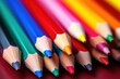 A vibrant close up of a bunch of colored pencils. Ideal for educational and artistic projects