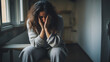 Vulnerable woman at home experiencing depression 
