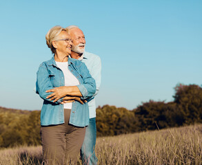 Wall Mural - woman man outdoor senior couple happy lifestyle retirement together smiling love old nature mature