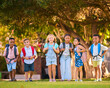 © Monkey Business - Portrait Of Multi-Cultural Primary Or Elementary School Students Outdoors At End Of Day