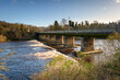 Wylam Road Bridge above River Tyne.  The River Tyne at Wylam located in Northumberland on the tree-lined riverbanks of the Tyne Valley