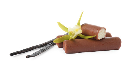 Glazed curd cheese bars, vanilla pods and flower isolated on white