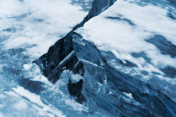 Wall Mural - Ice hummocks on Baikal Lake. Transparent blue ice floe. Great backdrop for your design with copy space.