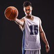 © Duncan/peopleimages.com - Man, portrait and basketball player in studio for sport, competition and training on black background. Professional athlete, career and exercise with ball for game, hobby and healthy model in fitness