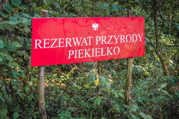 Canvas Print - Sign of Piekielko forest Nature Reserve, located in area of Welski Landscape Park, Warmia and Mazury region of Poland