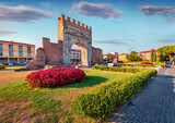 Fototapeta Natura - Spectacular morning view of Arch of Augustus. Splendid summer cityscape of Rimini town, Italy, Europe. Traveling concept background.