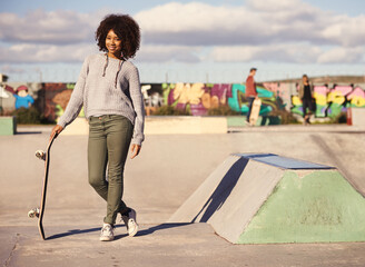 Poster - Portrait, fashion and black woman for exercise, hobby and skating in park with skateboard in city. Skater, fitness and face of female person for trendy, edgy and hipster clothing in urban town