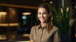 Hotel receptionist welcoming guests professional in earthy tones