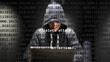 Cyber attack fileless attack text in foreground screen, anonymous hacker hidden with hoodie in the blurred background. Vulnerability text in binary system code on editor program.