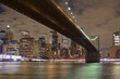 Night landscape of Manhattan and Brooklyn Bridge in winter. New York City, United States