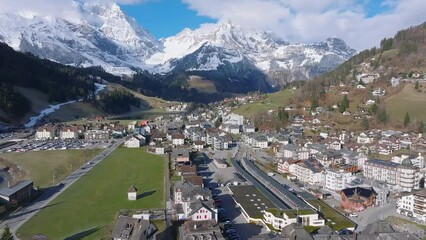 Wall Mural - Aerial panorama of the Engelberg village in Switzerland. View on the Swiss village Engelberg in the winter with snow covering the entire scenery