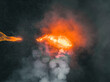 © AmazingAerialAgency - Aerial view of a lava explosion and the fog in Iceland.