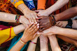 © Jezper - All hands together, united diversity or multi-cultural partnership in a group