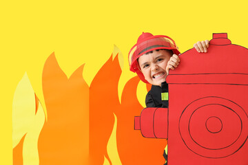 Sticker - Cute little firefighter with paper hydrant and flame on yellow background