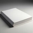 A white book with a white cover against a white background.