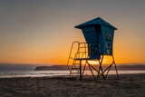 Fototapeta Tulipany - Lifeguard tower on Coronado beach at sunset in San Diego, California