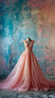 Light pink and peach color wedding or ball gown dress on a mannequin in front of a painting vertical