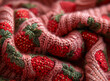 Knitted fabric with a strawberry pattern