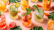 A vibrant collection of summer refreshments, each glass brimming with fresh fruits and garnished with mint, displayed with tropical foliage accents, refreshing summertime ambiance.