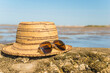 Beach beat Straw hat and sunglasses on a