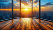 Sun setting over a city skyline seen through the large windows of an empty office space