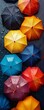 Create a captivating close-up shot of colorful umbrellas lining the street on a rainy day, capturing the unique patterns and textures for a modern art gallery display