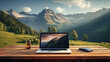 Laptop with Mountain Wallpaper on Wooden Table