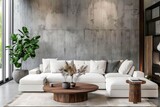 Fototapeta Boho - A stylish interior featuring a white sofa set against a textured concrete wall with green plant accents